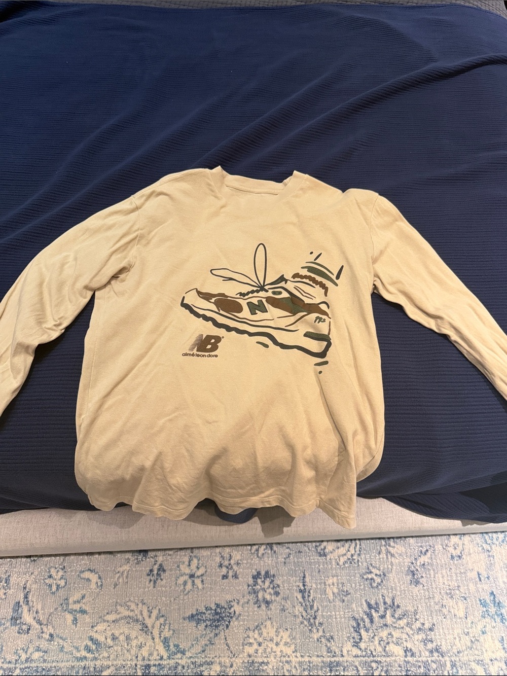 Aime Leon Dore New Balance Beige Long Sleeve Tee with Black Sneaker Graphic